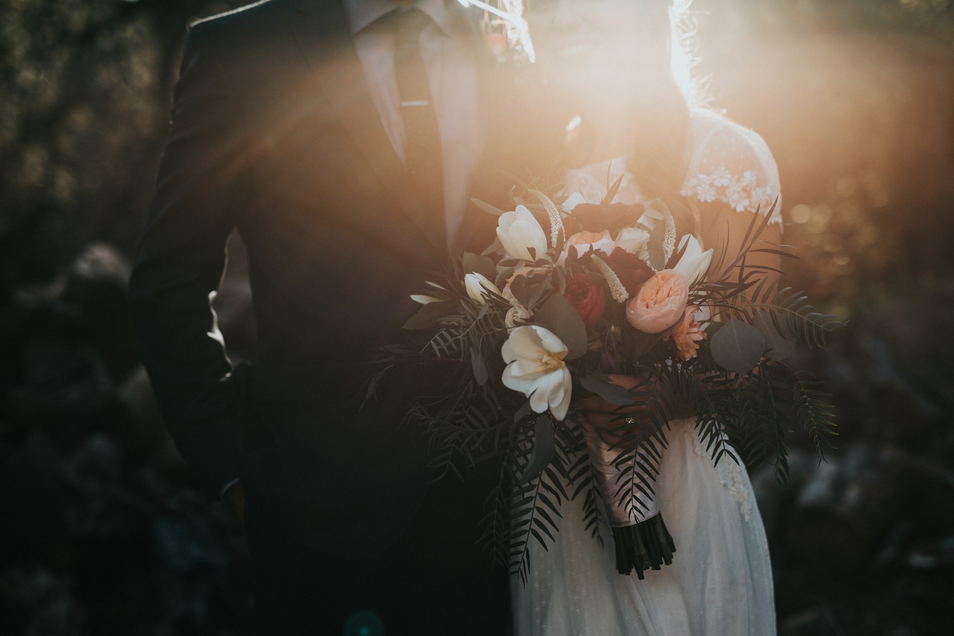 Beautiful wedding couple in golden light
